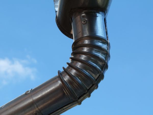Metal Downspout Installation in Westlake