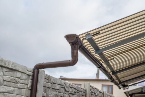 Plastic Downspout Installation in Westlake